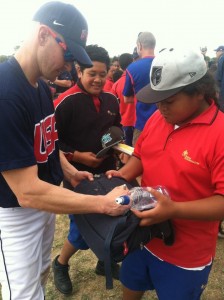 Team USA's Adam LaLonde with local fans in Auckland, New Zealand. Says Adam: "Got off the plane and drive straight to the field for an exhibition game against Argentina. Won 5-2. Now trying to get on the right time here in Auckland. Beautiful place! " (click to enlarge)